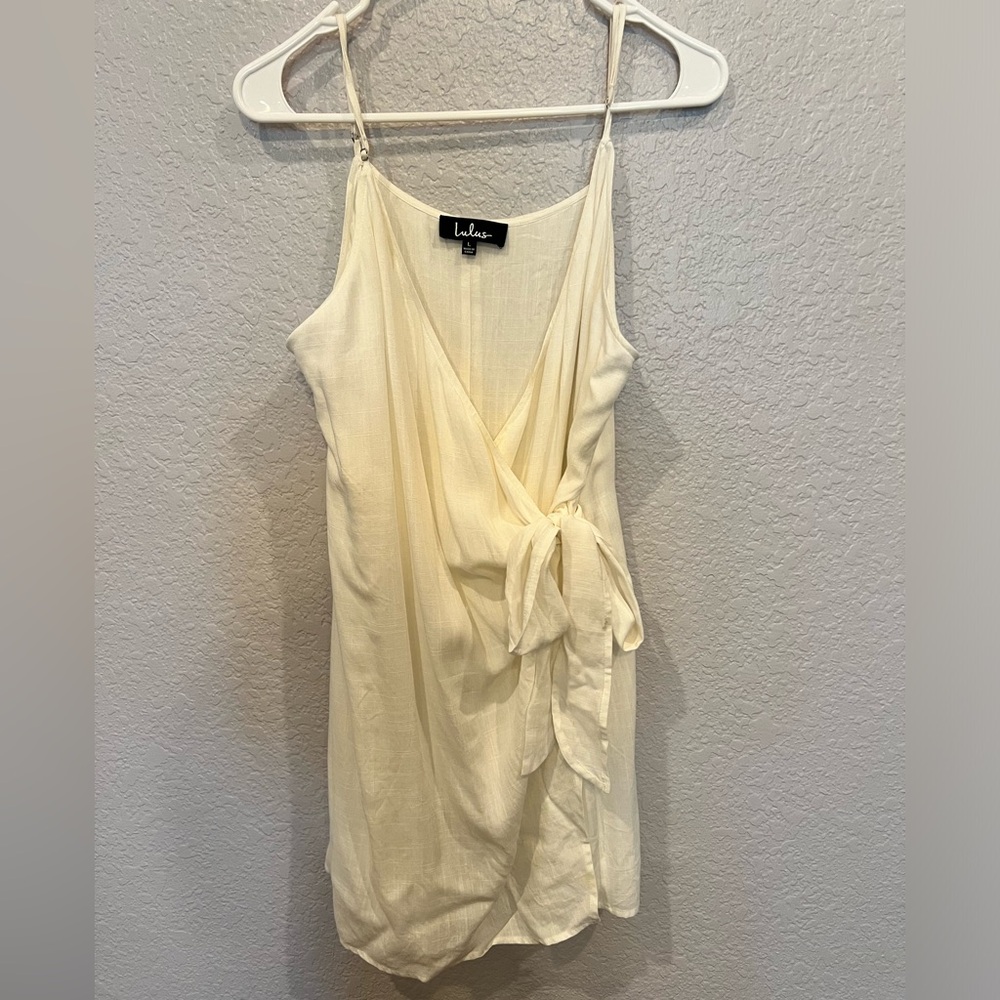 Gorgeous flowy cream wrap tunic top from Lulu's